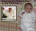 Anna-sitting-on-mom-and-dads-bed-102602