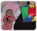 Anna-watching-mom-open-a-present-for-her-122502