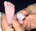 Annas-foot-versus-a-quarter-092402